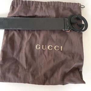 Mens black Gucci belt with Gucci logo pattern